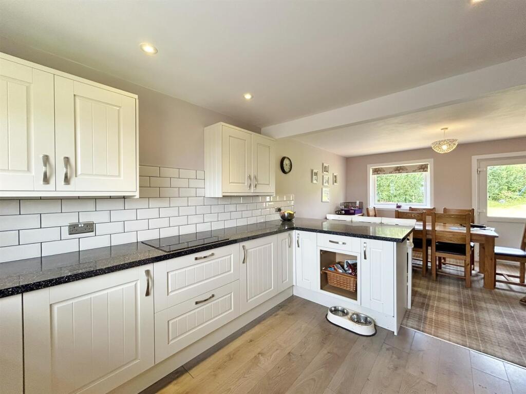 Kitchen towards dining