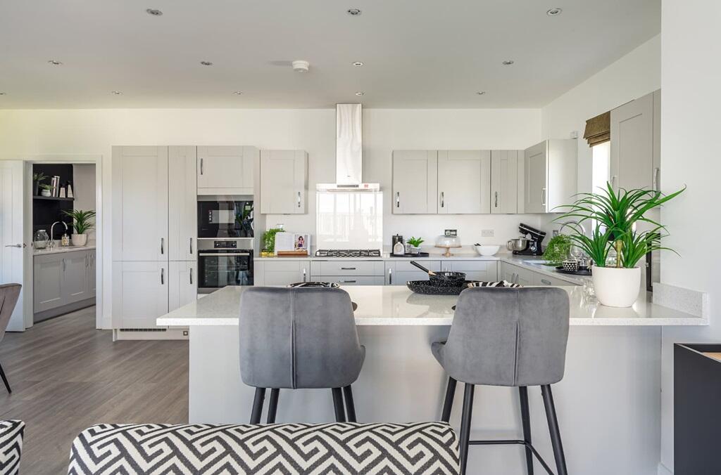 This spacious kitchen is the social hub of the home