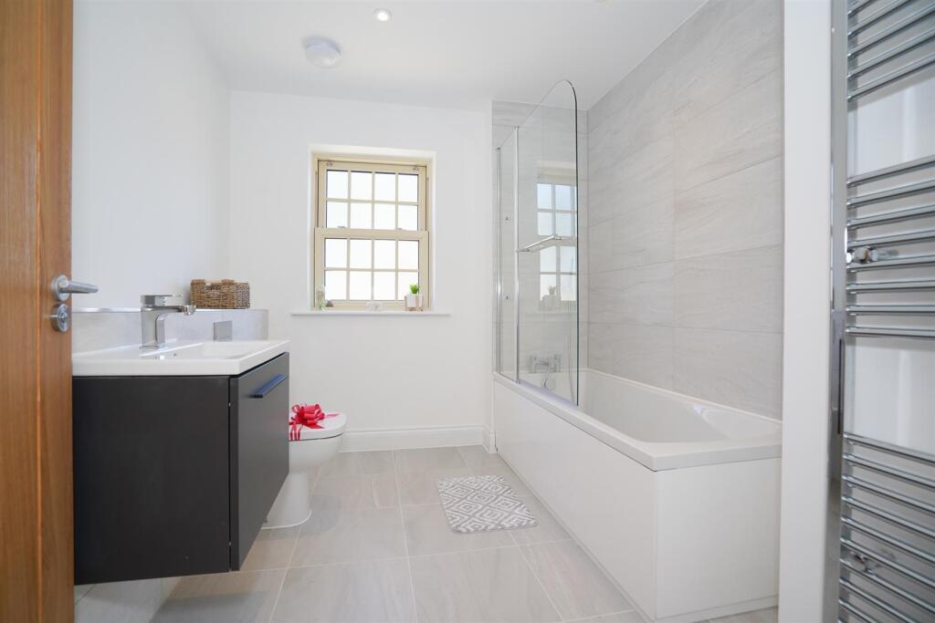 THE DORCHESTER 1ST FLOOR FAMILY BATHROOM.jpg