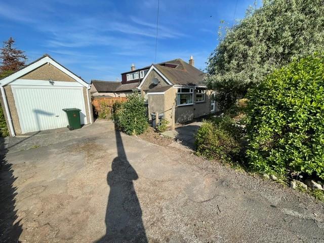 Detached Garage and Driveway