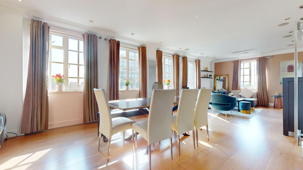 A bright and spacious contemporary living room ...