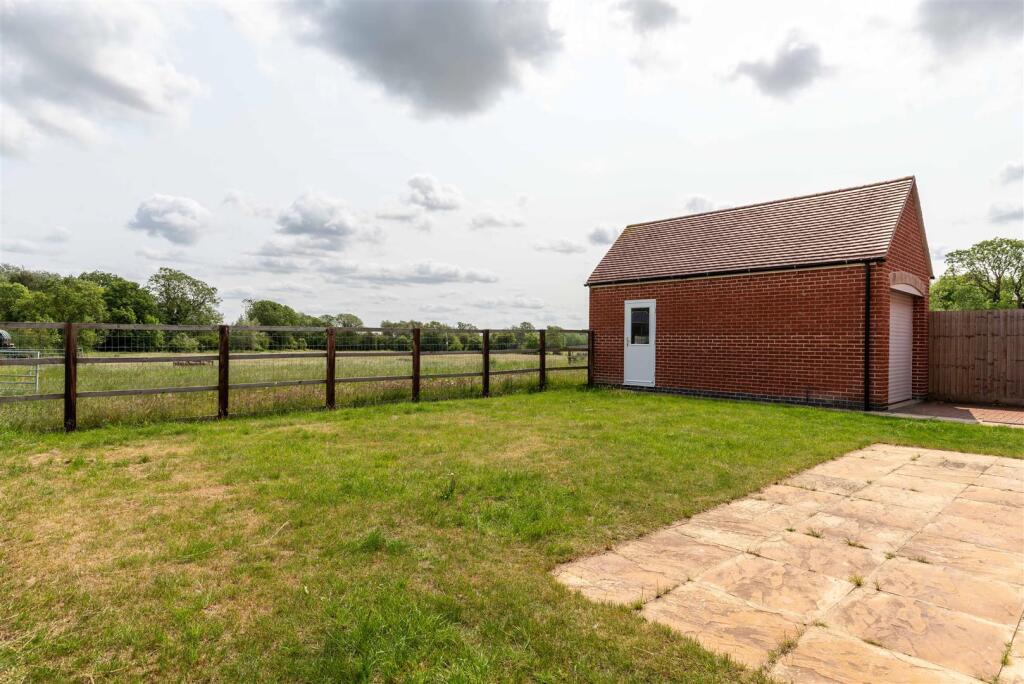 Rear Outlook and Detached Garage