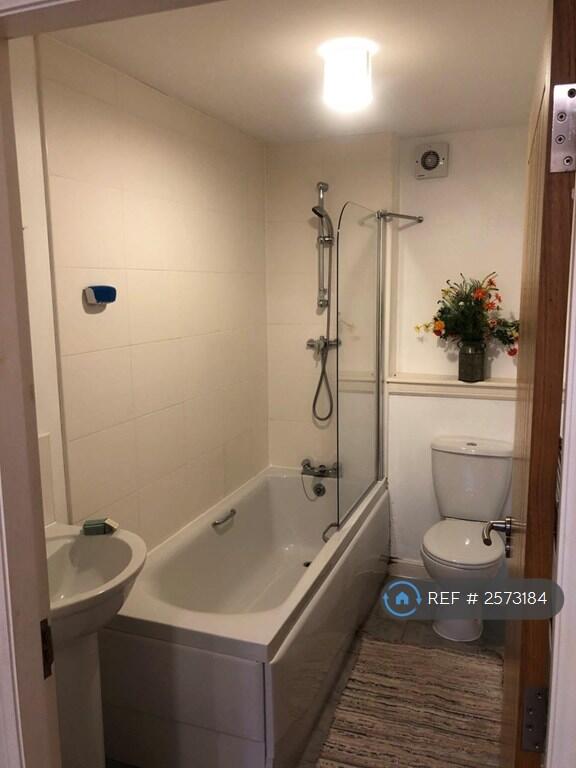 Bathroom With Bath And Power Shower