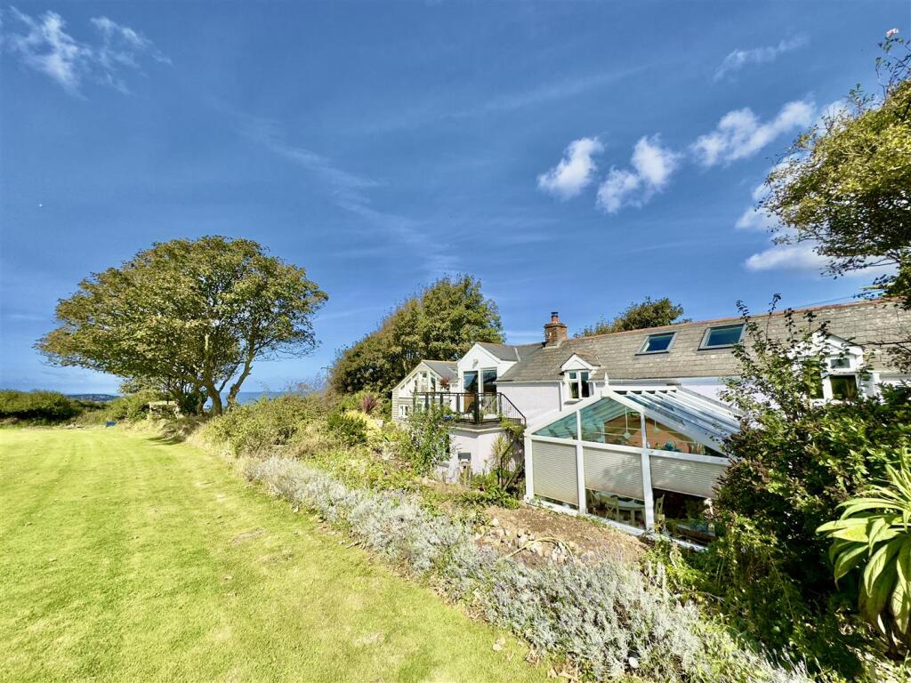 FRONT WITH LAWN.jpeg