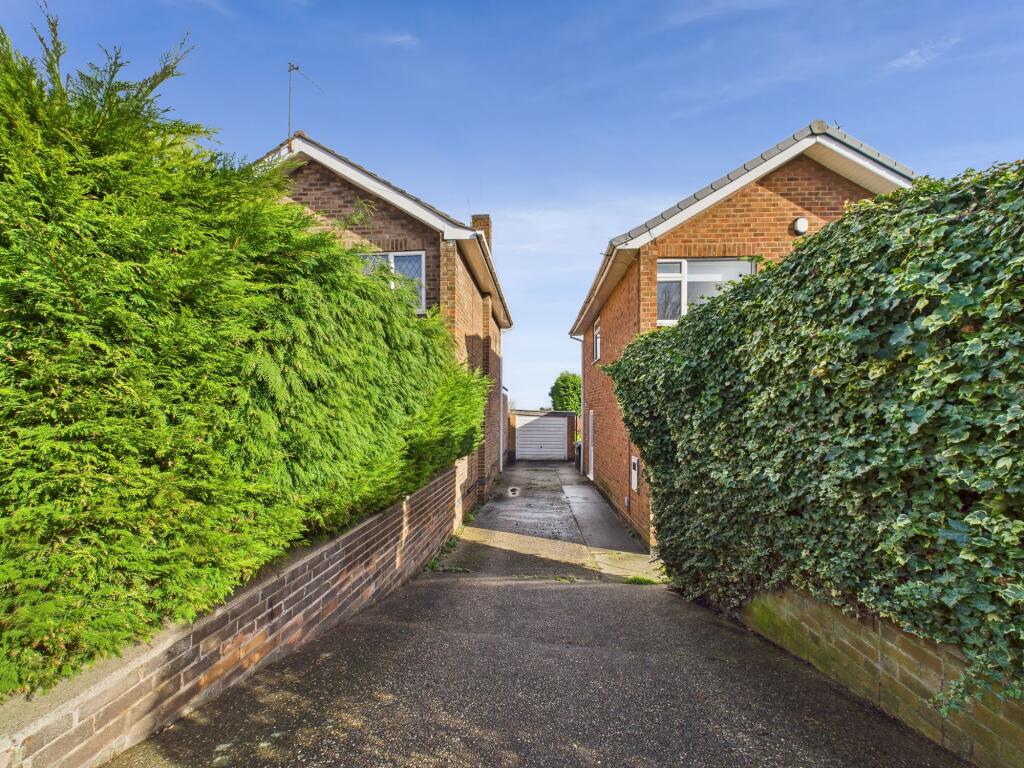 Driveway leading to Garage