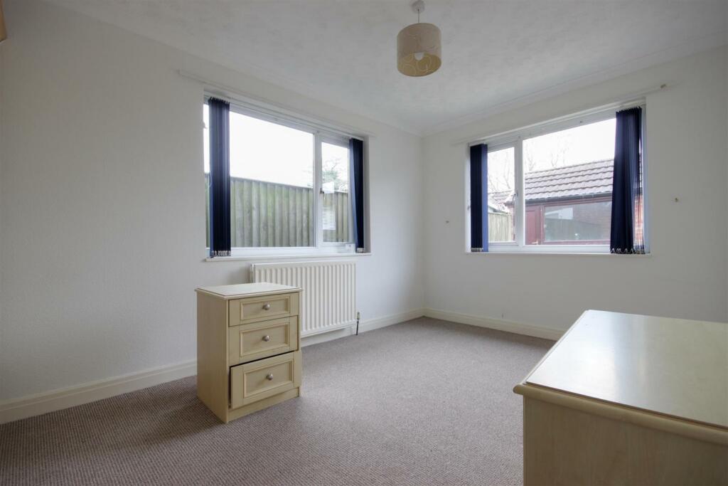 BEDROOM 1 (REAR)
