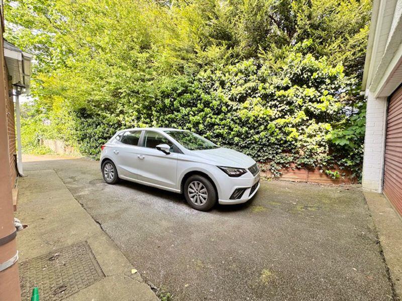 Area to side in front of garage