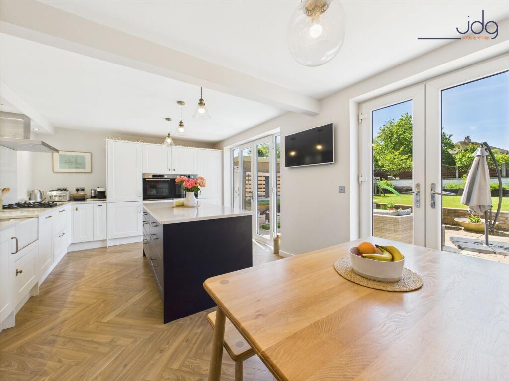 Open Plan Kitchen Diner with twin sets of French doors