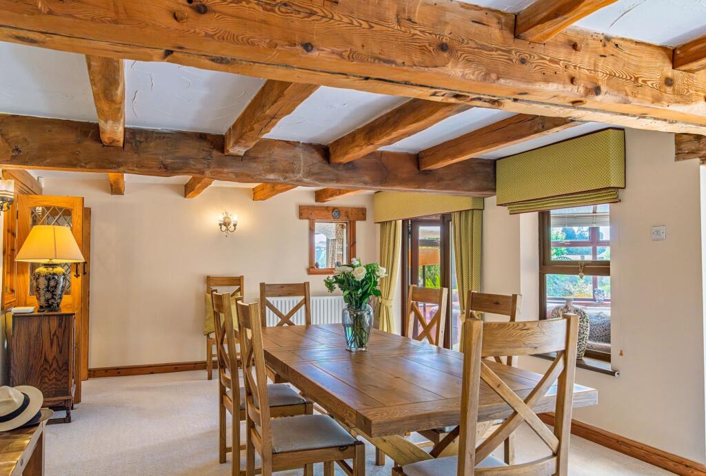 Dining room with patio doors to the Sun Room