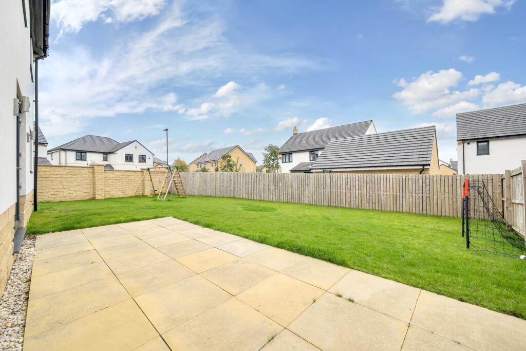 Patio and south facing back garden