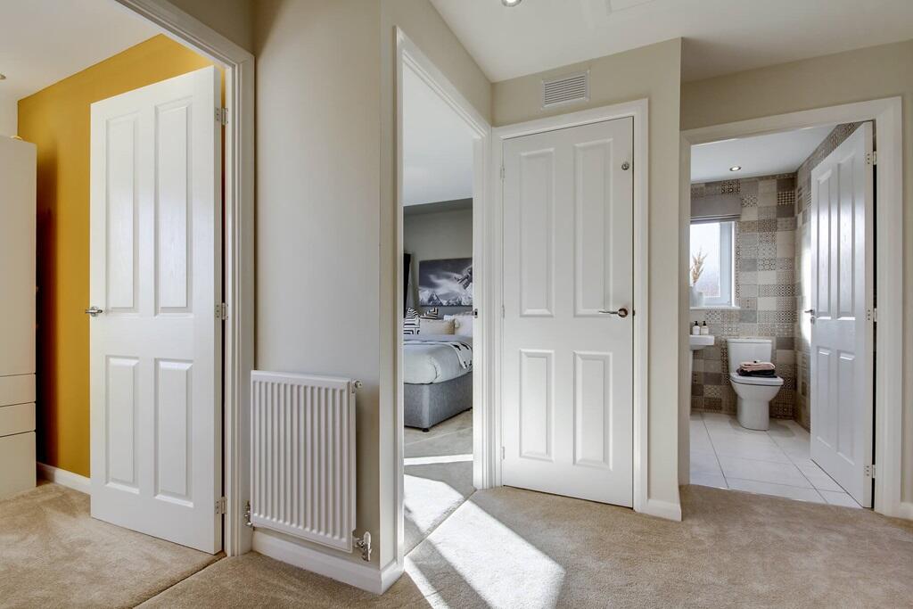 The central landing leads into 4 bedrooms and the family bathroom