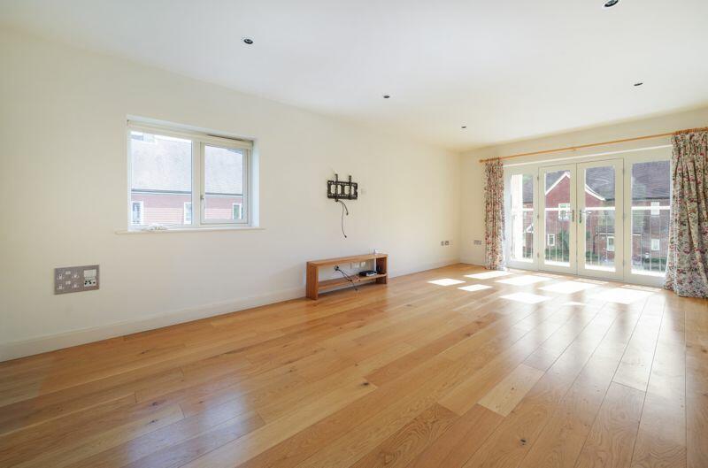 Living/dining room with balcony access