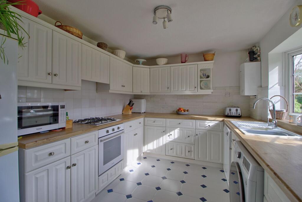 Kitchen with large bay window 