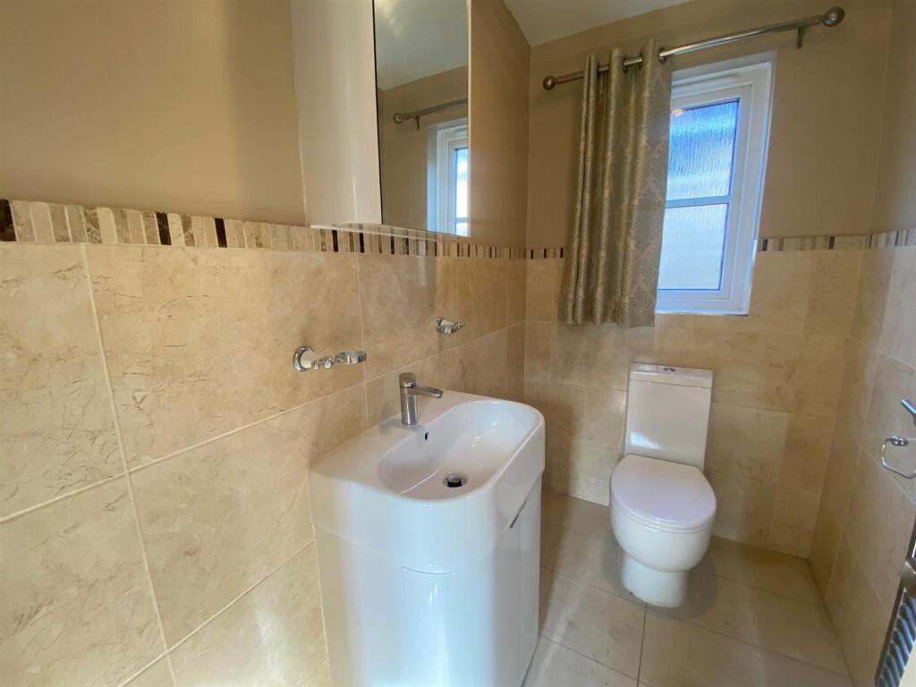 DOWNSTAIRS CLOAKS.jpg