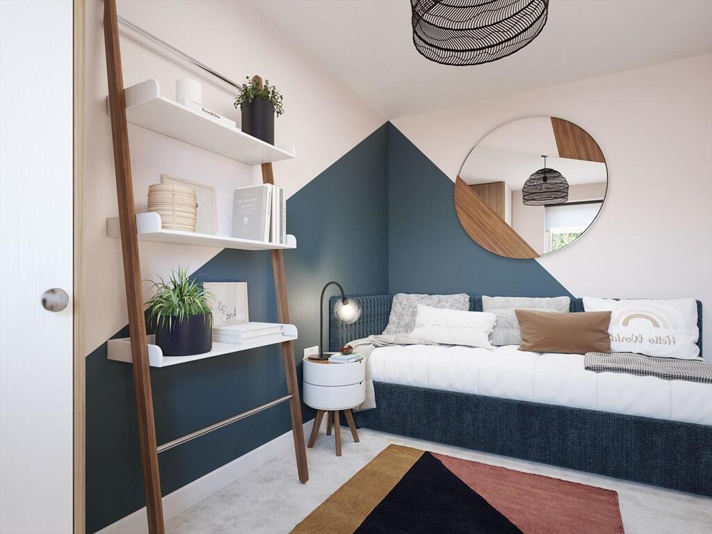 Bedroom 3 is well-suited to a child or playroom