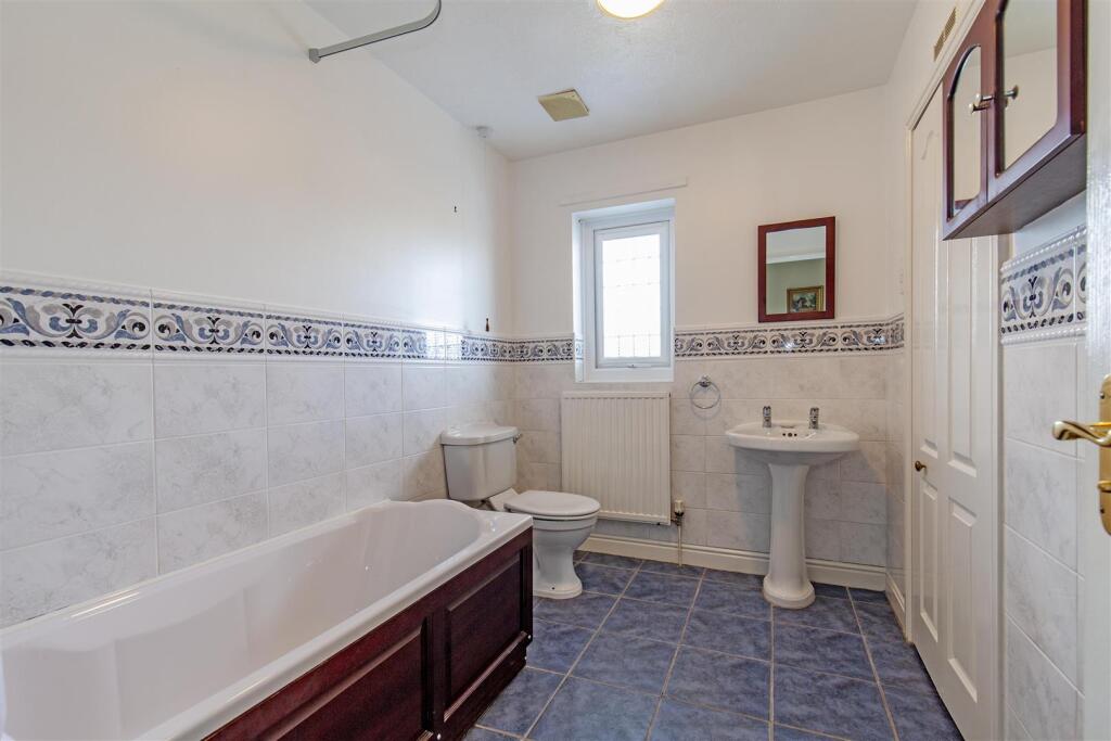 Half Tiled Family Bathroom
