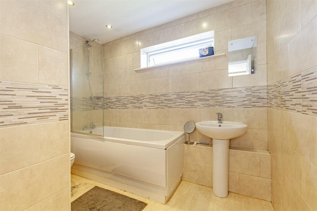 Fully Tiled Bathroom