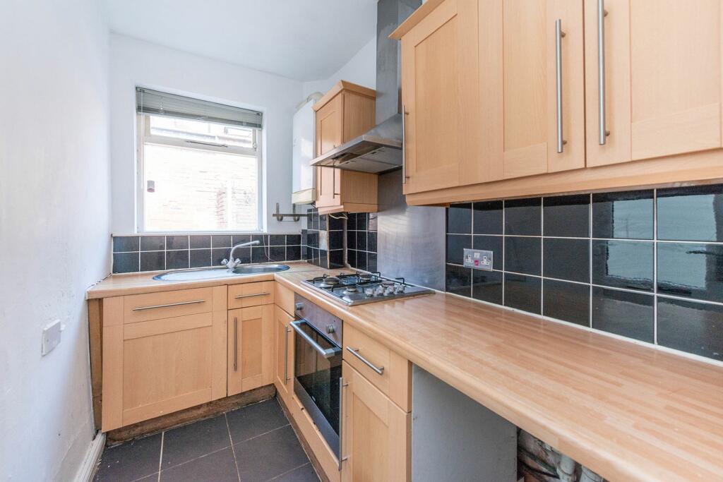 SITTING ROOM DINING ROOM AND KITCHEN