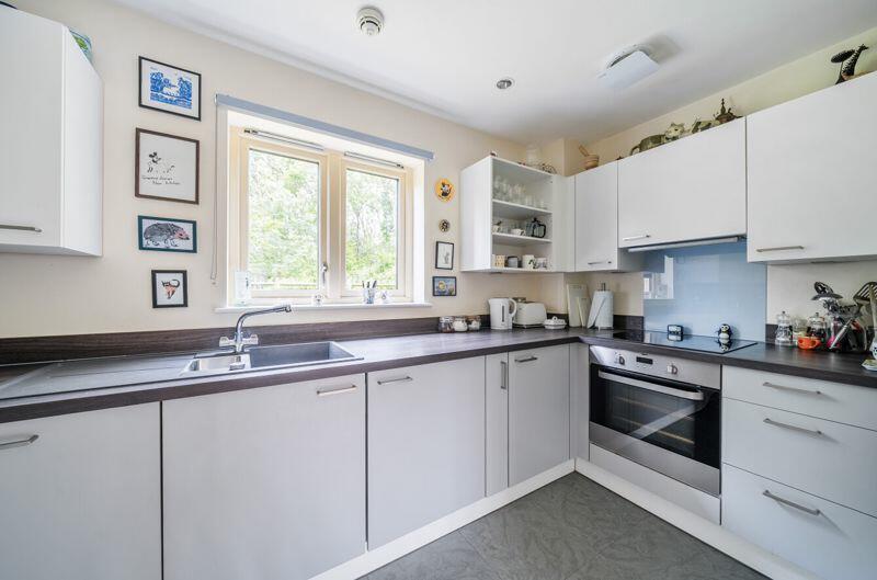 Kitchen with built-in appliances
