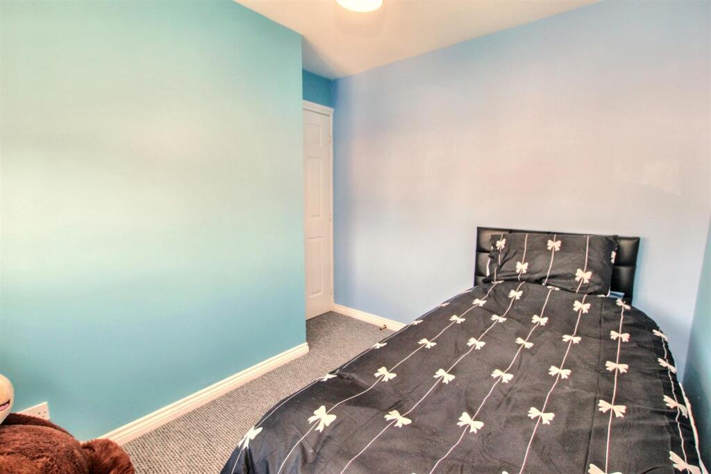 16- Bedroom Three.jpg