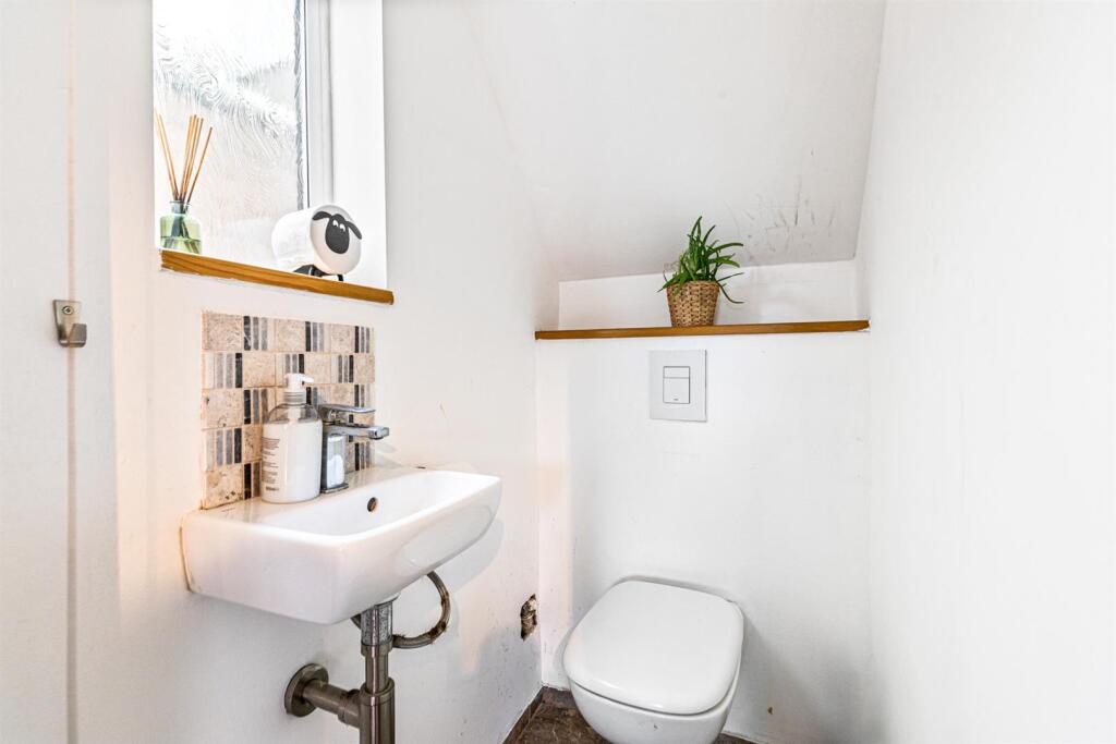 DOWNSTAIRS CLOACKROOM