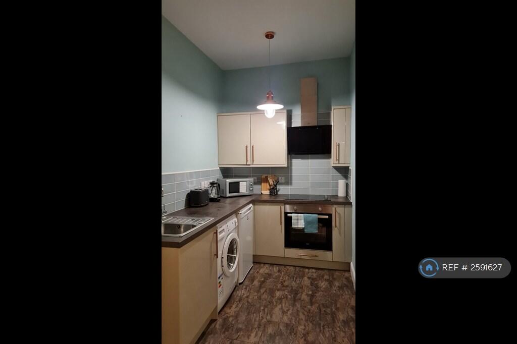 Kitchen With All Essential Appliances