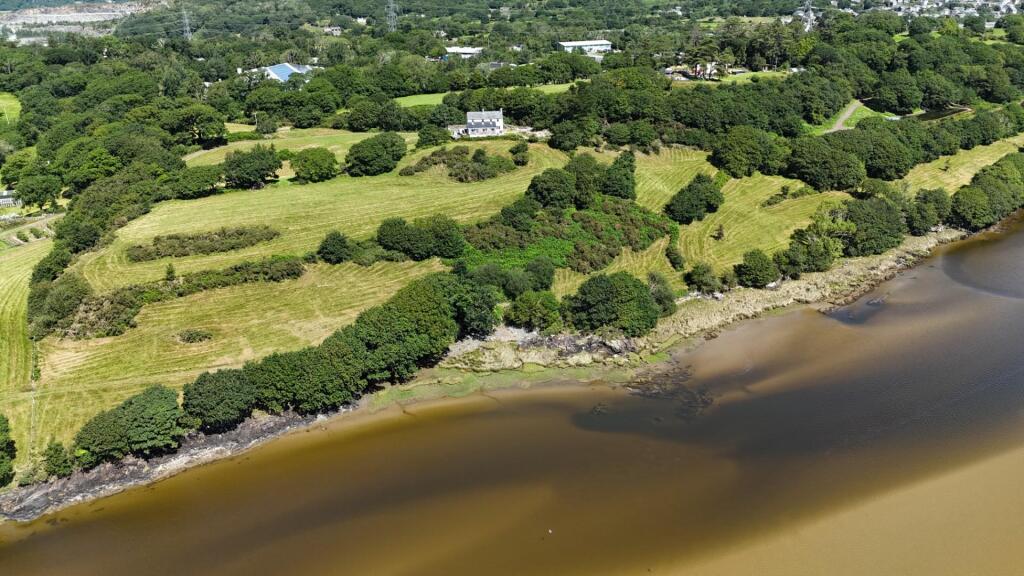Tyddyn Heulyn from Estuary.JPG