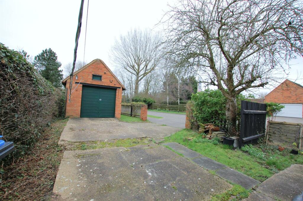 Driveway/detached Garage