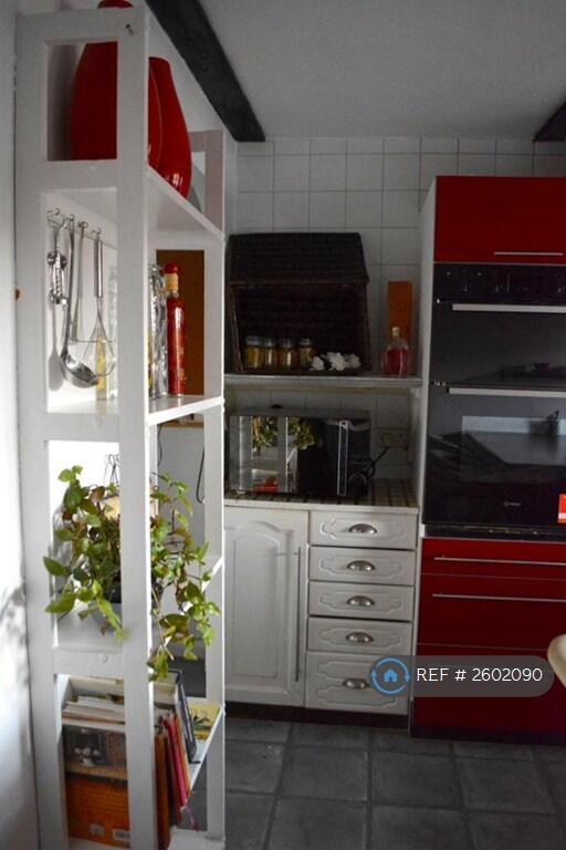 Kitchen With Breakfast Bar And New Appliances