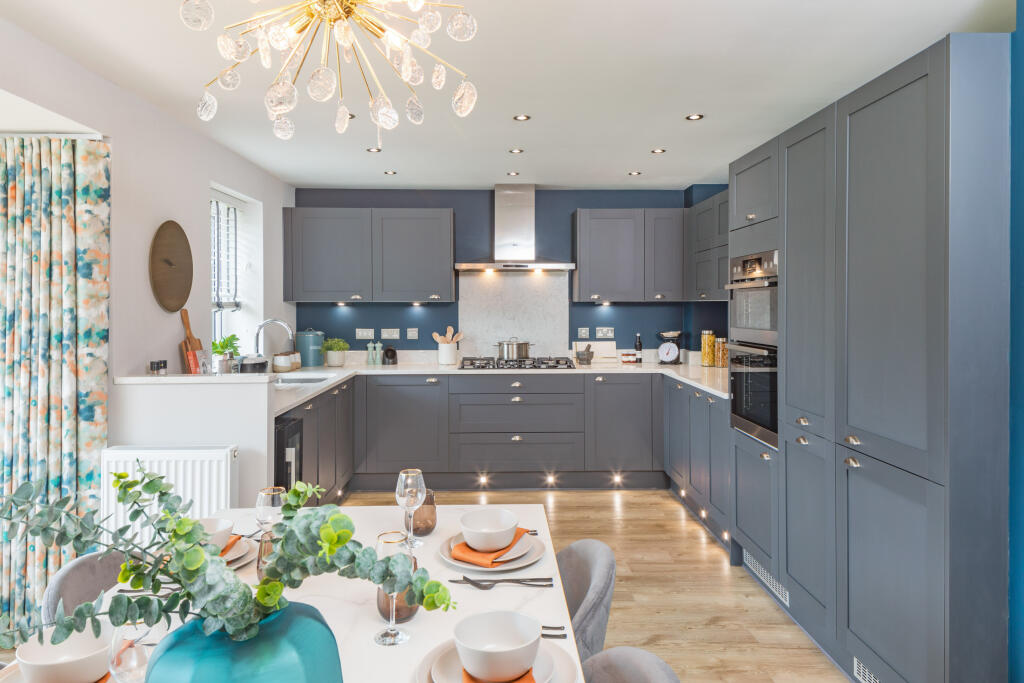 Open plan kitchen dining room in the Holden 4 bedroom home