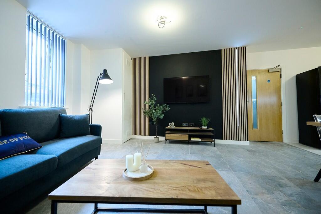 A stylish and inviting living room featuring a ...