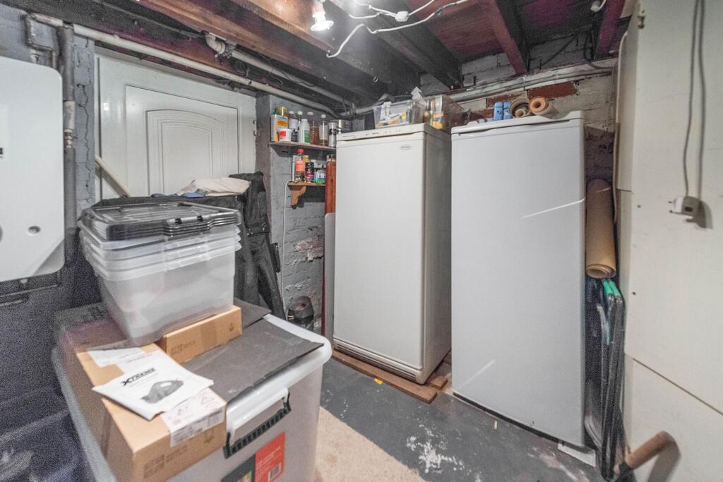 CONVERTED LOWER GROUND FLOOR AND STORE ROOM