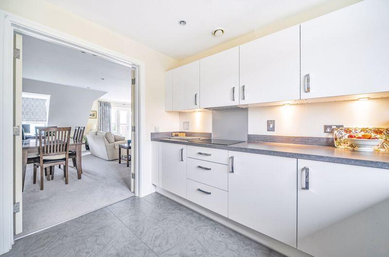 Dining area through to kitchen