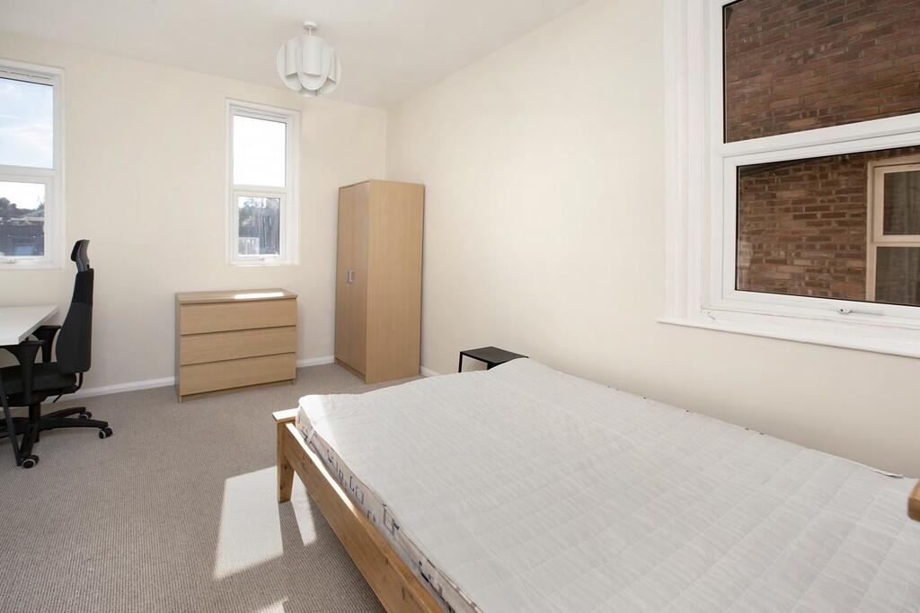 14Archibold202208...