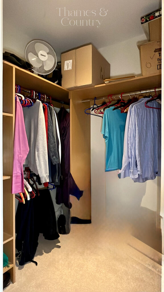 Primary bedroom Walk in wardrobe