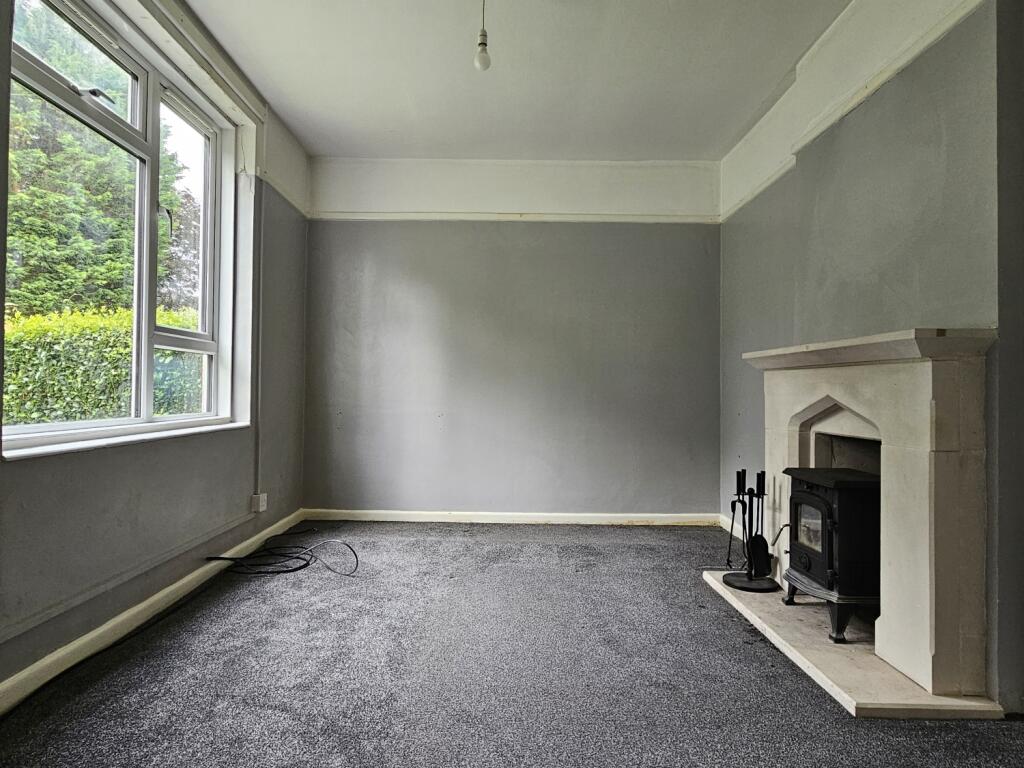 Living room with wood burner