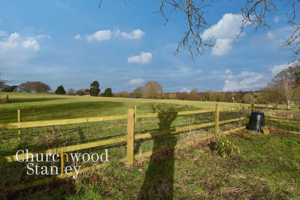 Undulating countryside beyond