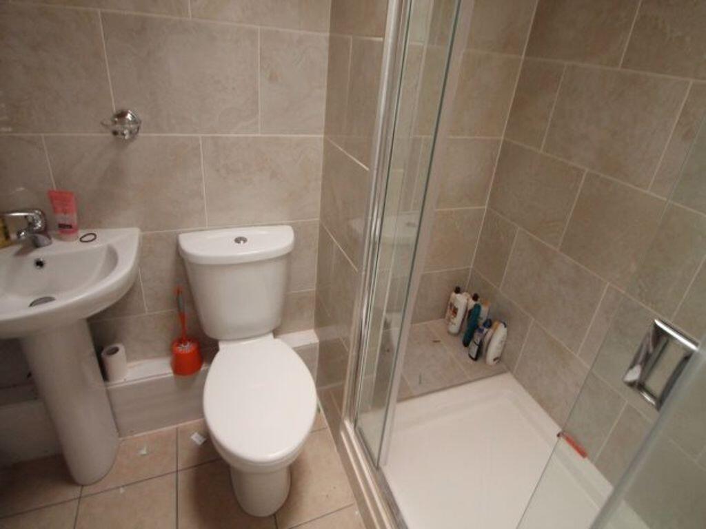 A neat and well-maintained bathroom featuring a...
