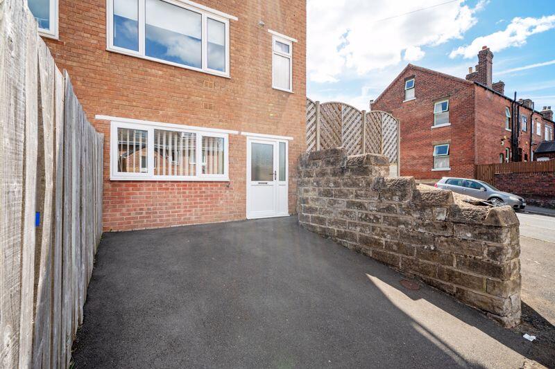 Rear Entrance / Driveway 