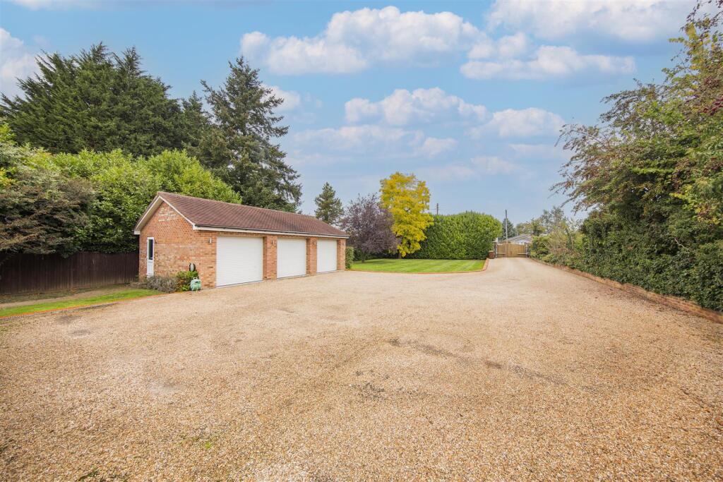 Drive and Triple Garage