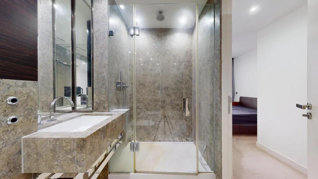 A stylish bathroom suite featuring a spacious g...