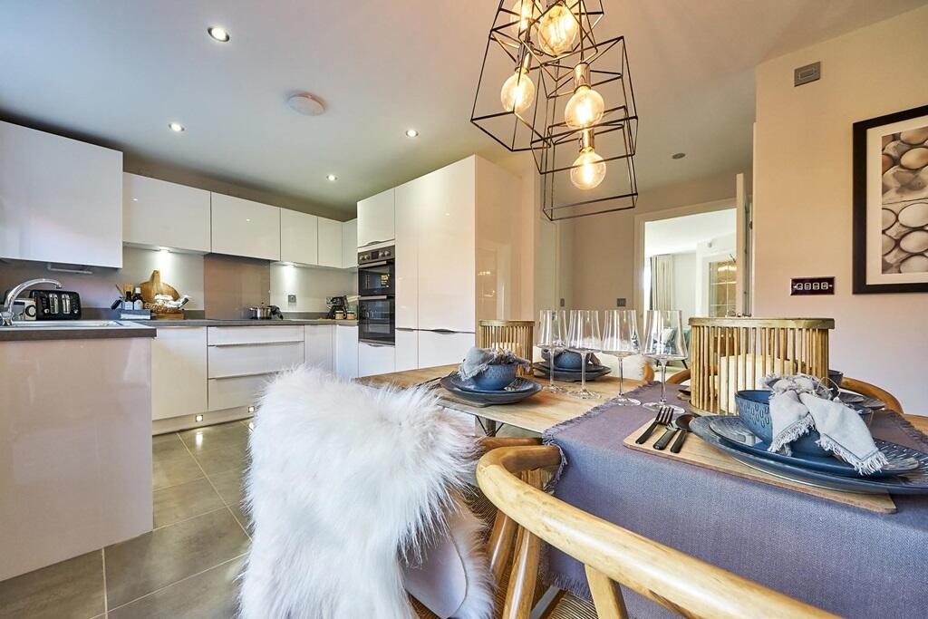 Spacious kitchen dining room, ready to entertain- typical Taylor Wimpey home