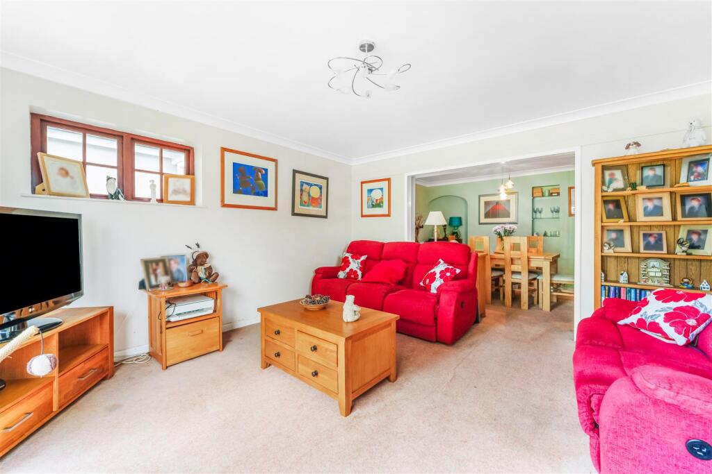 1.3 - lounge open to dining room.jpg