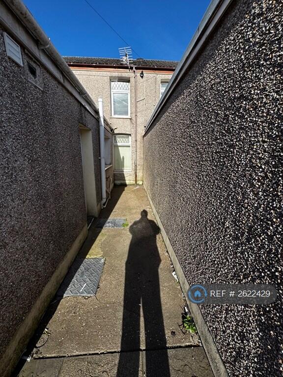 Rear Exit To Back Garden