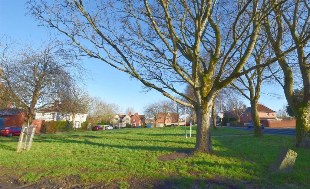 View across green in front of house.jpg